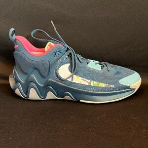 Gainnis Nike blue basketball shoes.